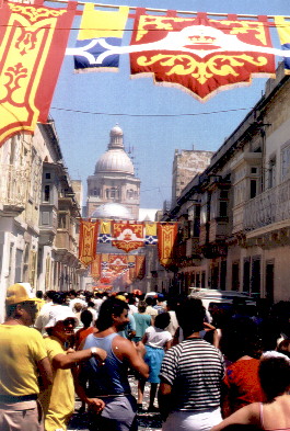 The end of the procession is less religious and more festive