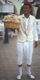 Selling bunches of sweet-smelling mimosa
